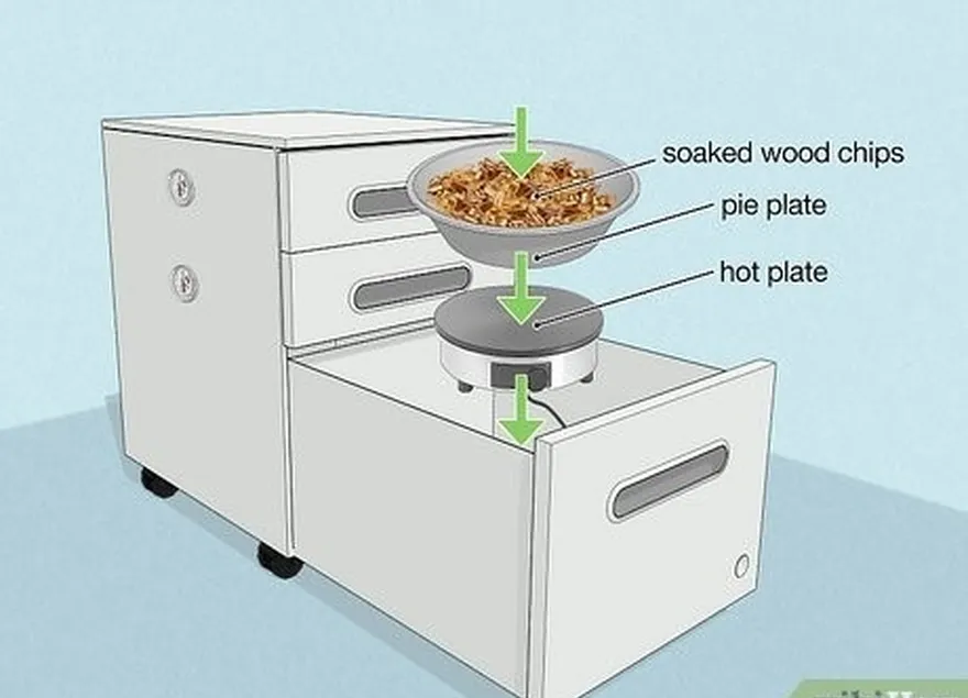 шаг 3 поместите в нижний ящик шкафа горячую плиту и щепки.