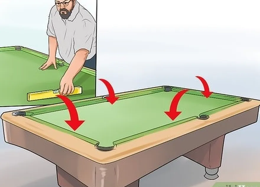 шаг 4 установите плотницкий уровень's level on each of the sides of the pool table.