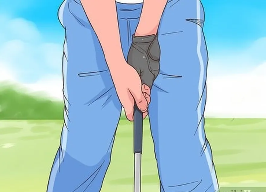 шаг 2 выберите клюшку, которая's comfortable to hold while in the putting stance.