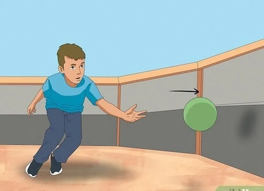 шаг 3 проведите мяч по стене, чтобы лучше его контролировать.