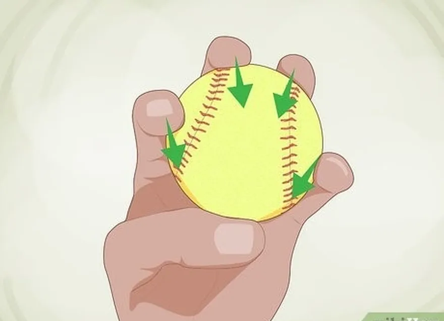 шаг 1 равномерно распределите 4 пальца вдоль шва мяча.