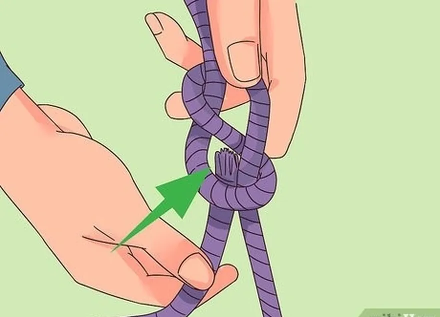 шаг 5 пропустите веревку через нижнюю часть узла 'восьмерка'.